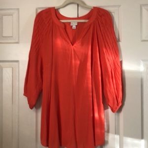 Top worn very little, 1X in size , orange in color, like new